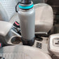 Vehicle cup holder adaptor