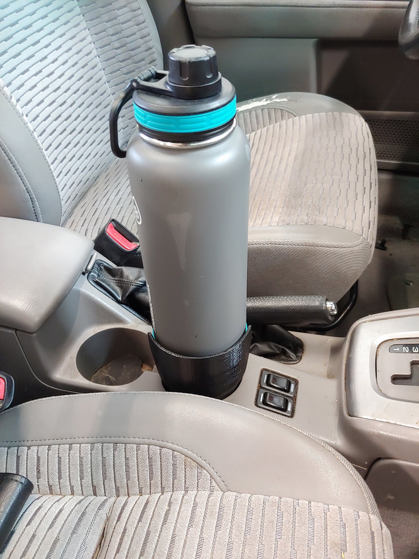 Vehicle cup holder adaptor