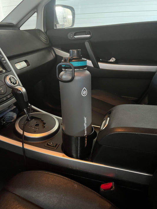 Vehicle cup holder adaptor